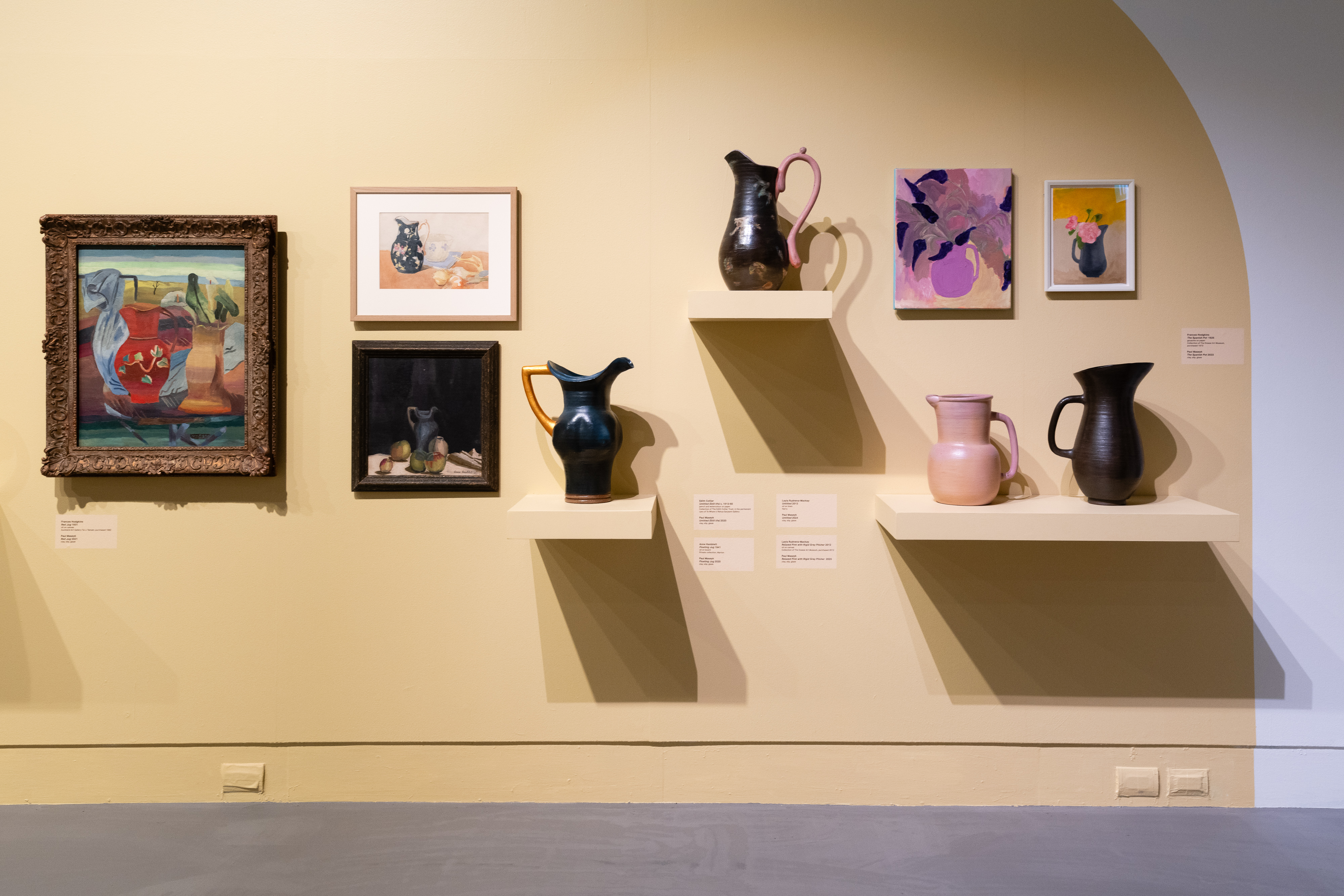 An installation shot of Paul Maseyk's jugs with the paintings they are responding to. This image features the work of Frances Hodgkins, Edith Collier, Anne Hamblett and Layla Rudneva-Mackay.